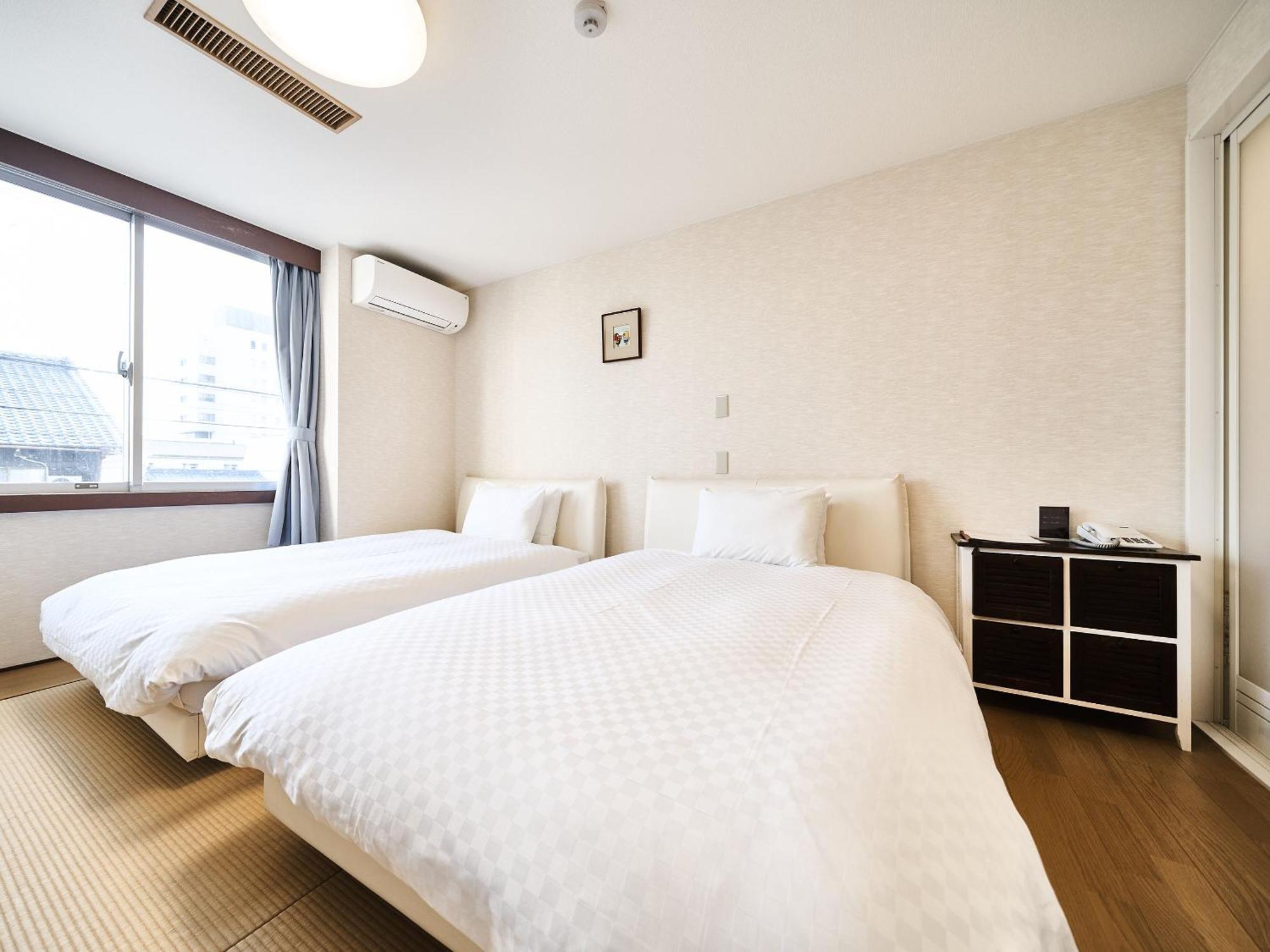 Okasan Hotel Ogaki Rum bild