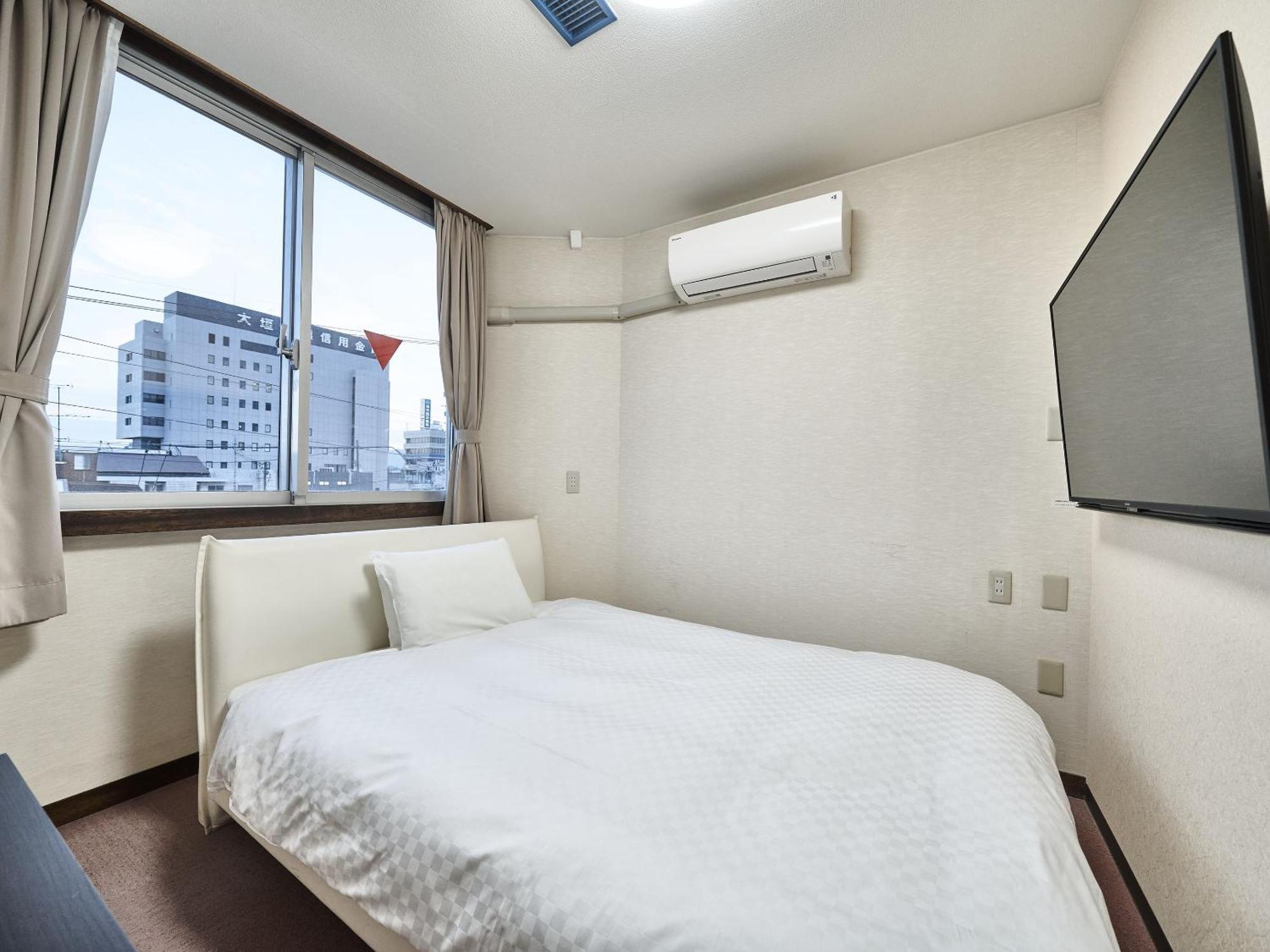 Okasan Hotel Ogaki Rum bild